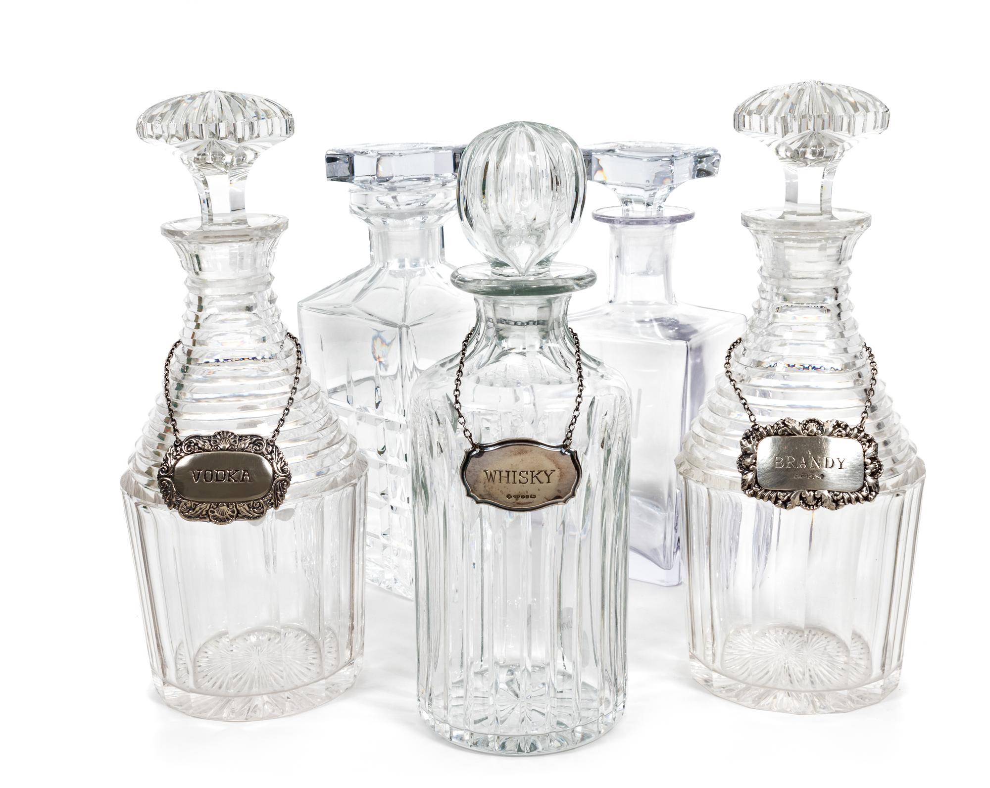 A Group of Five Glass Decanters — 19TH/20TH CENTURY