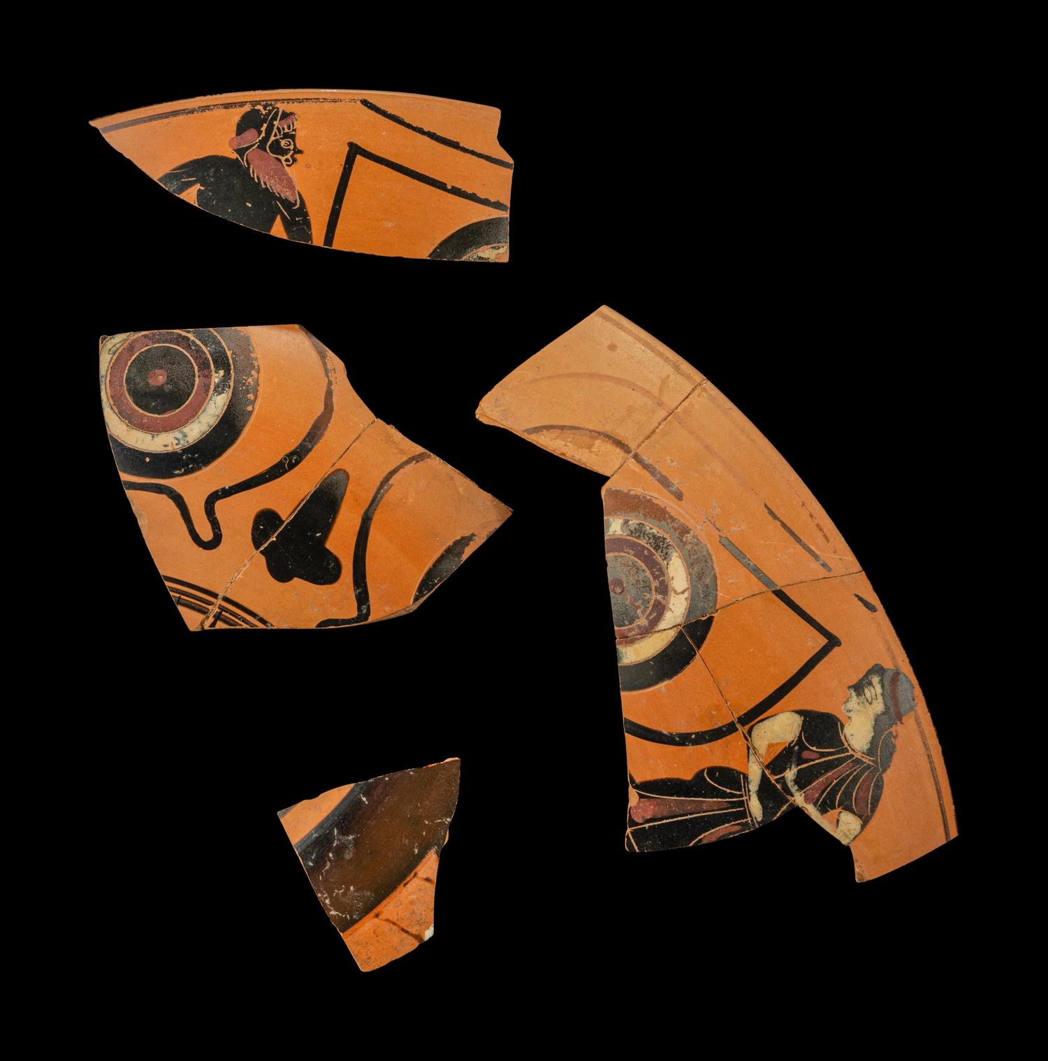 Four Attic Black-Figured Eye Cup Fragments with a Maenad and Satyr