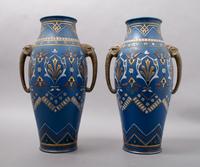 A Pair of Mettlach Pottery Vases, Height 13 1/2 inches.