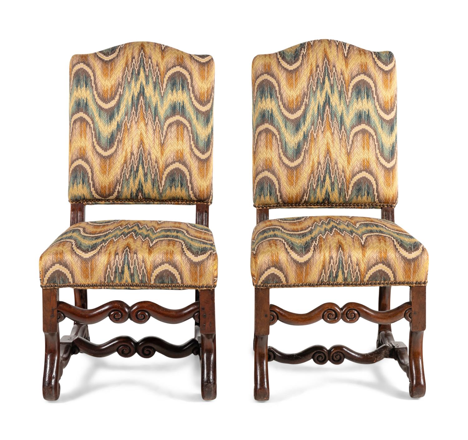 A Pair of Louis XIV Walnut Side Chairs