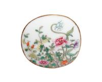 A Ruby Sgraffito Ground Famille Rose and Underglaze Blue Porcelain Bowl