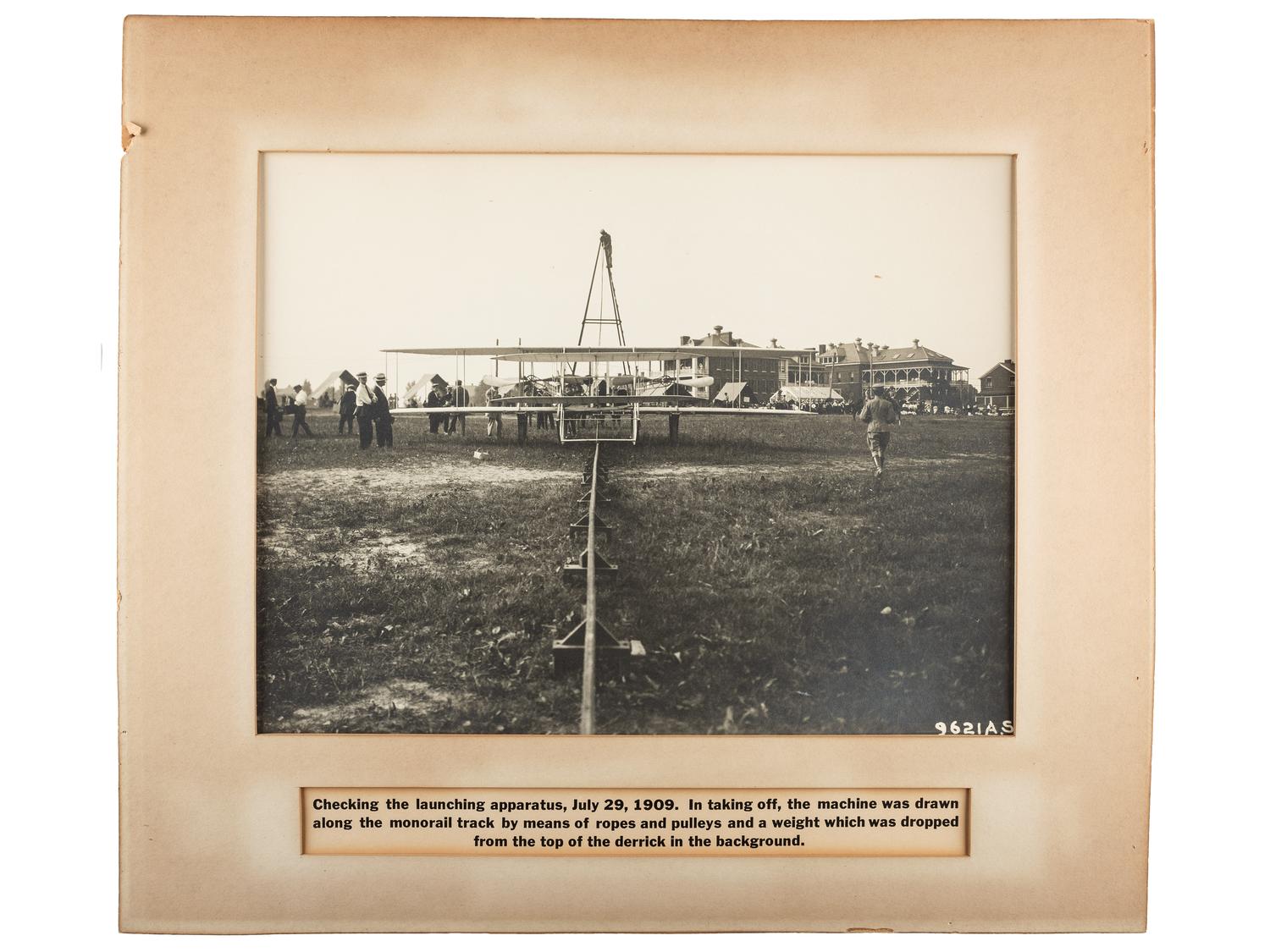 [AVIATION] -- [WRIGHT BROTHERS]. A group of 2 photographs, incl. views of Wilbur Wright and a Wright airplane, 1909.