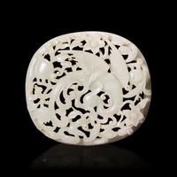 A Chinese Celadon Jade Reticulated Oval Plaque — 青玉镂雕鳳穿花佩
