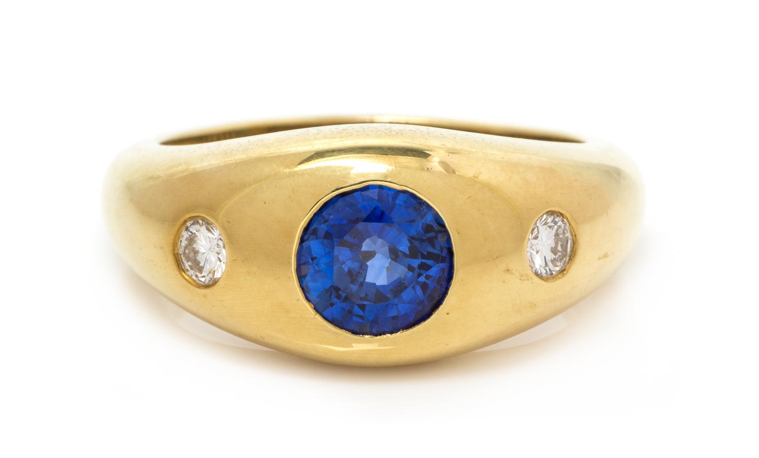An 18 Karat Yellow Gold, Sapphire and Diamond Ring, 7.05 dwts.