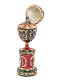 A Gold, Enamel and Gemstone-Mounted Nephrite Surprise Egg