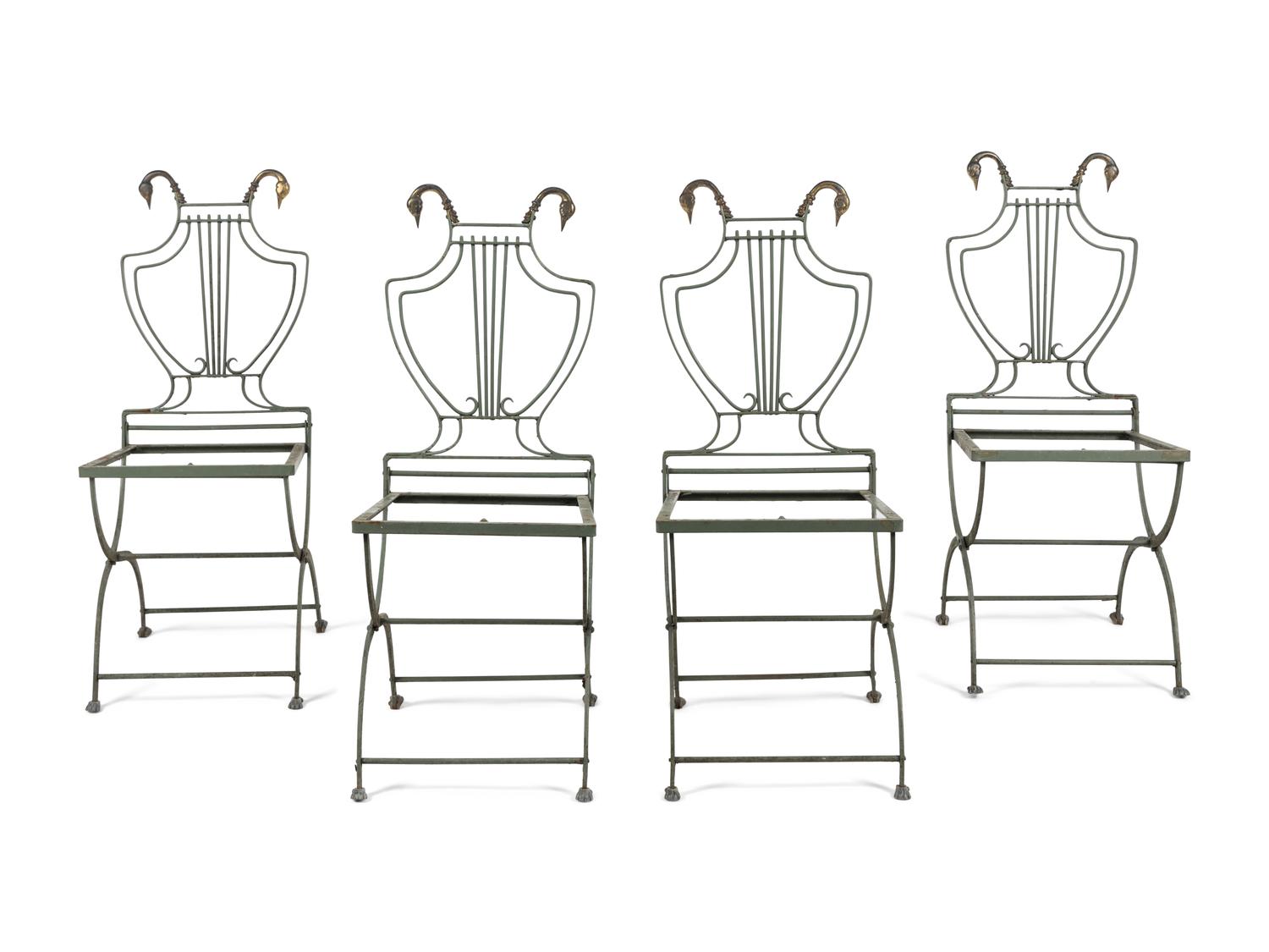 A Set of Four Painted Metal Folding Garden Chairs