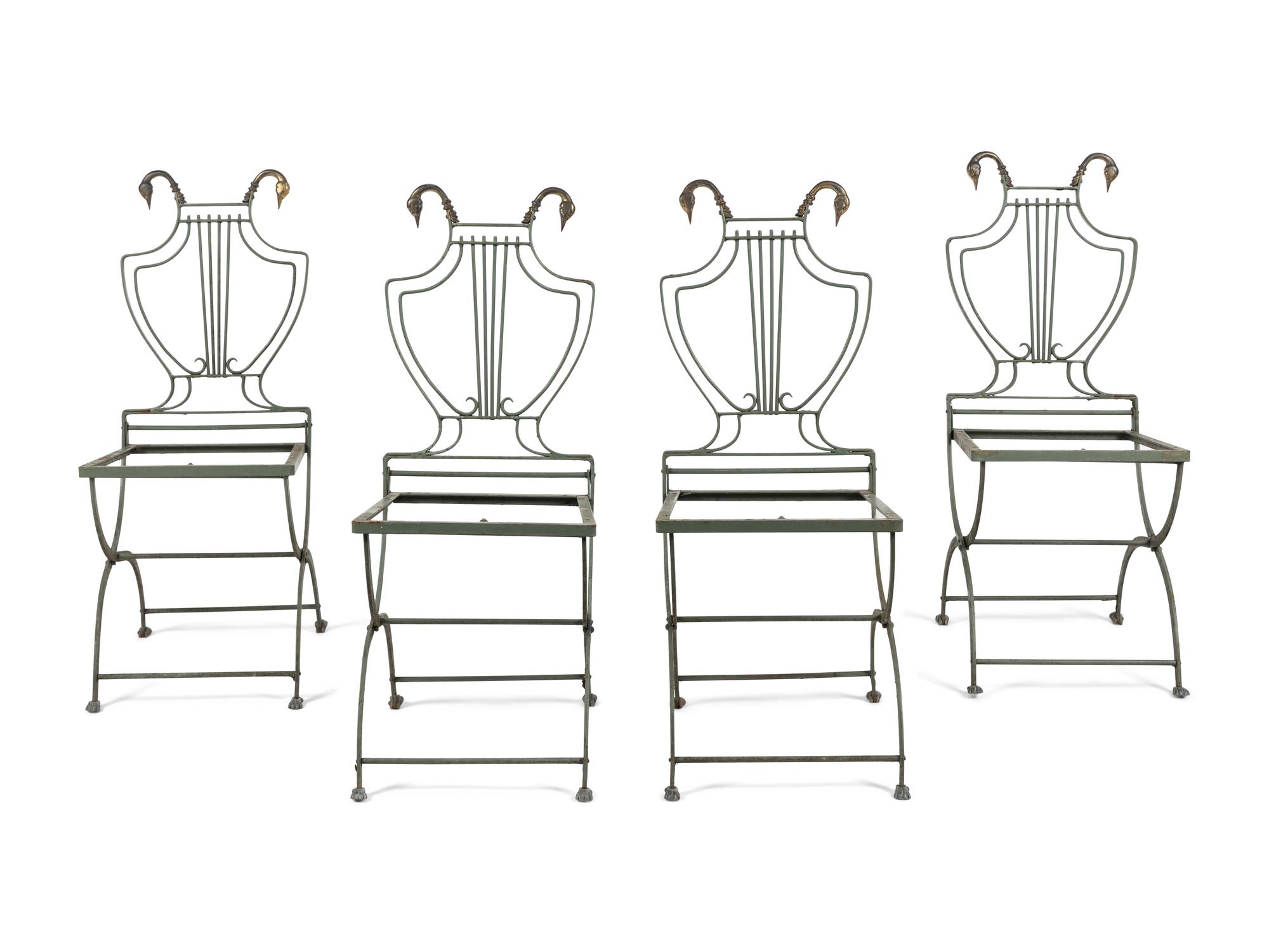 A Set of Four Painted Metal Folding Garden Chairs