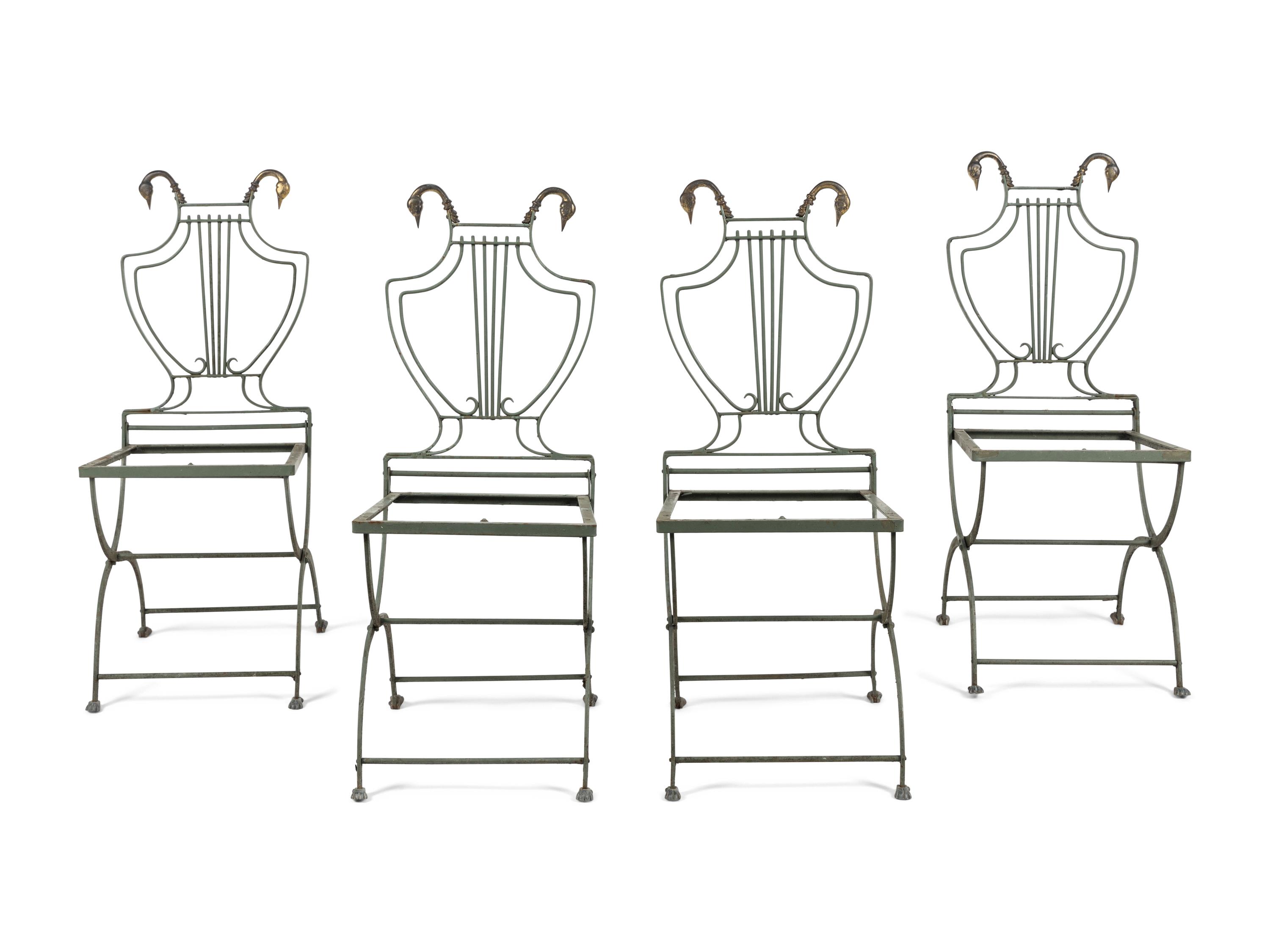 A Set of Four Painted Metal Folding Garden Chairs
