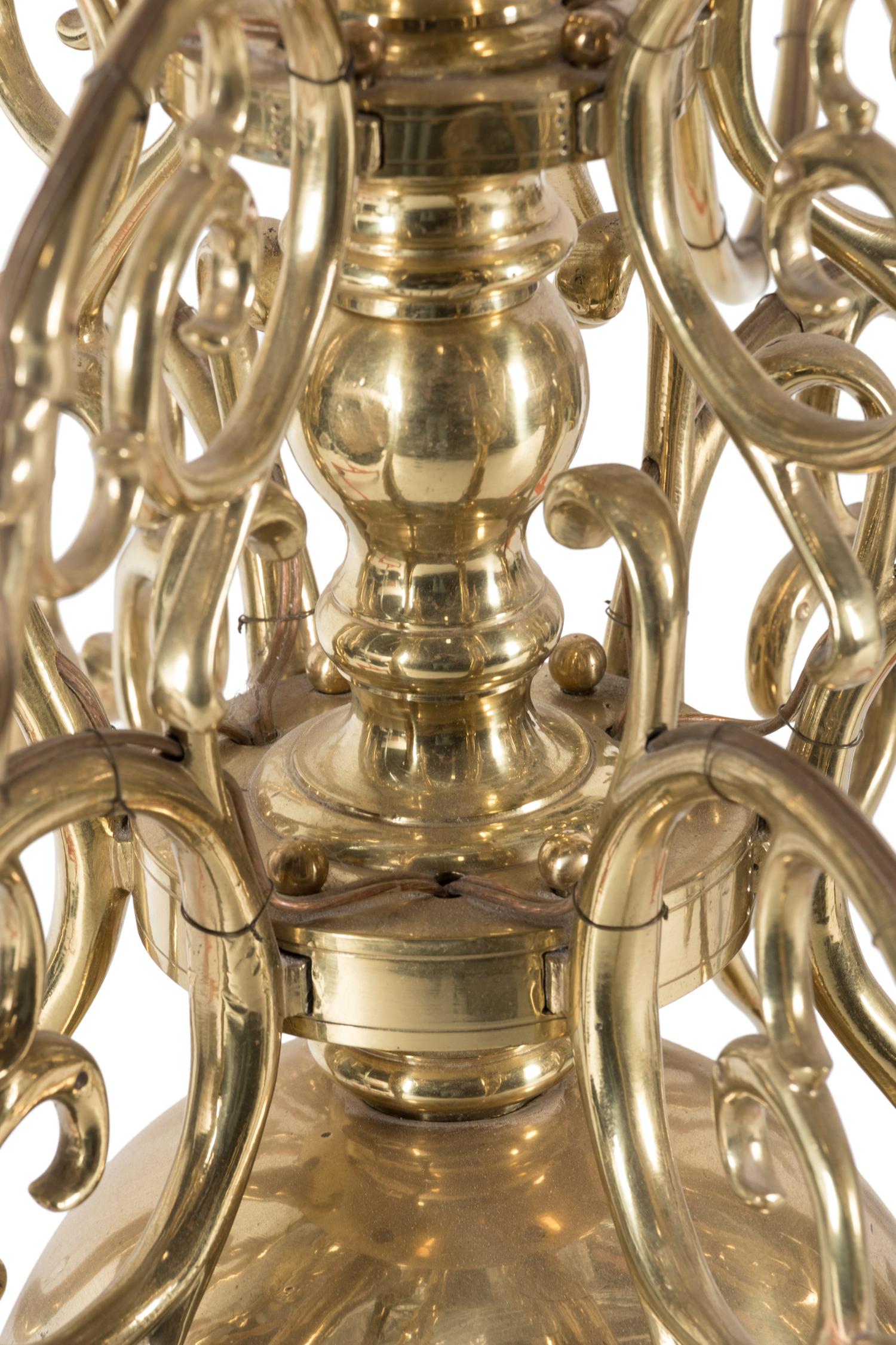 A Dutch Baroque Style Brass Eighteen-Light Chandelier