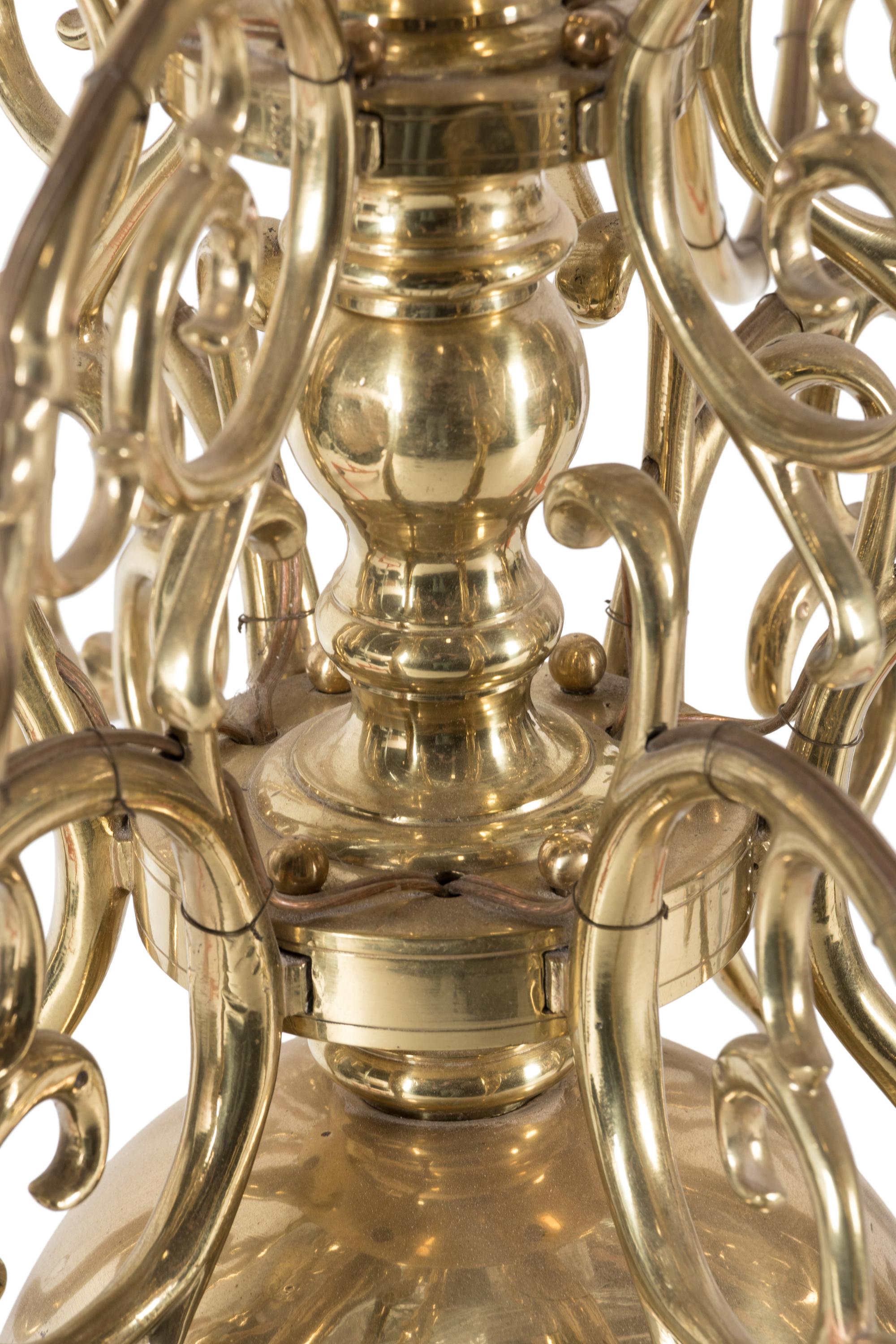 A Dutch Baroque Style Brass Eighteen-Light Chandelier