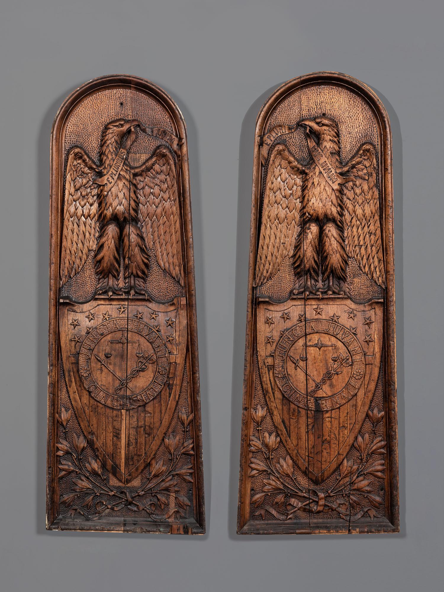 A Rare Pair of Eagle, Shield and Seal of Cincinnati Carved Walnut Ship's Gangway Boards