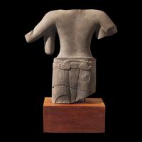 A Khmer Carved Grey Sandstone Torso of Lokesvara, 10th-First Half 12th Century 十世紀上半葉至十二世紀 高棉石造像