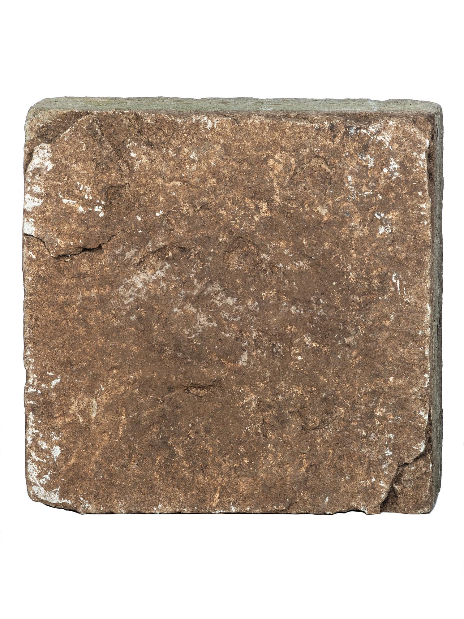 A Wrought Iron Boot Scrape with Stone Base