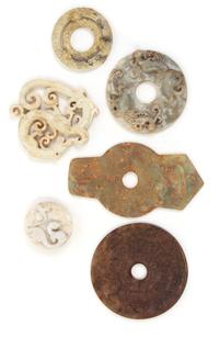 A Group of Six Archaic Jade Plaques Length of largest 8 1/2 inches.