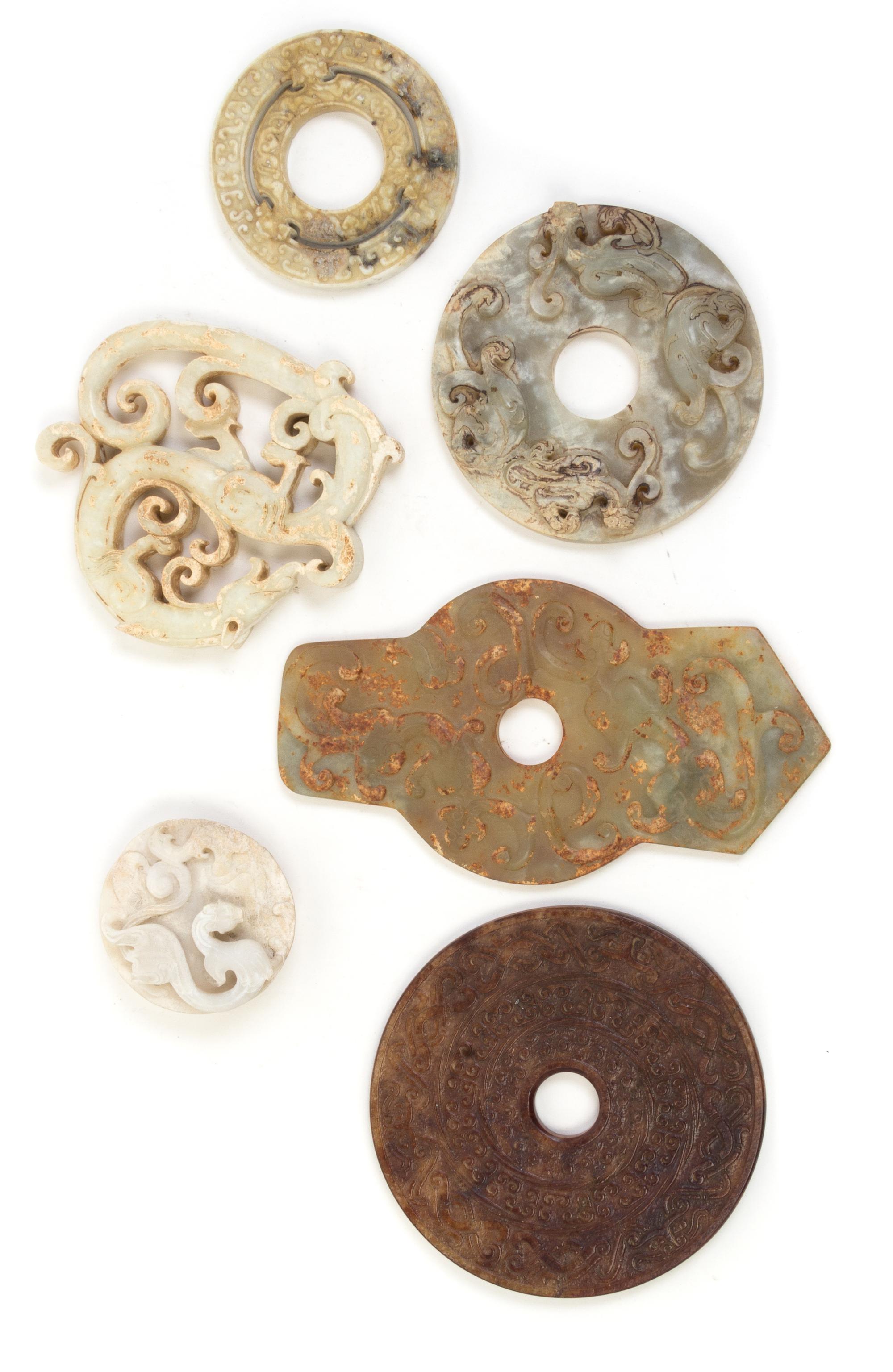A Group of Six Archaic Jade Plaques Length of largest 8 1/2 inches.
