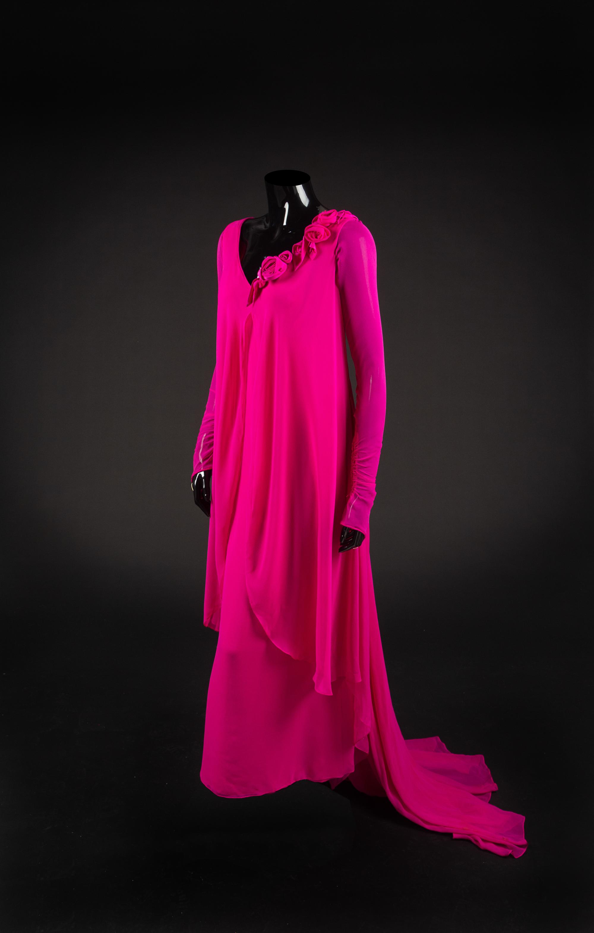 Dress, bag, necklace and earrings, 1989. Dress designed by Paul Zastupnevitch, made by Western Costume Company in Los Angeles. — Worn by Olivia de Havilland for the 15th People’s Choice Awards on March 12, 1989 to accept the People’s Choice Award for “Gone With the Wind” as the favorite film of all time.