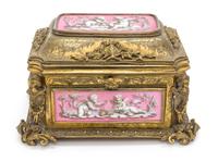 A Napoleon III Sevres Porcelain Mounted Gilt Bronze Table Casket Height 5 x width 7 1/2 x depth 5 1/2 inches. — TAHAN
