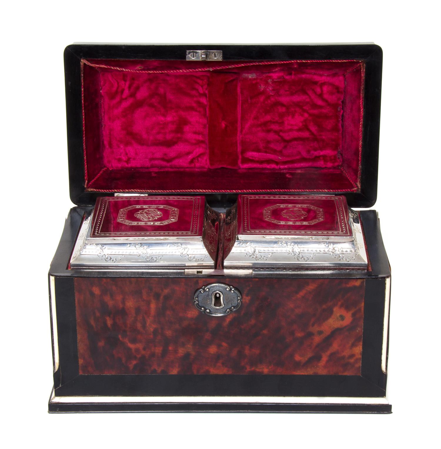 A George III Silver and Tortoise Shell Mounted Ebony Tea Caddy, Silver Liners Marked for Thomas Daniel, London, 1788, the hinged lid wi