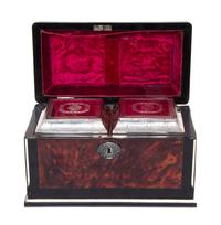 A George III Silver and Tortoise Shell Mounted Ebony Tea Caddy, Silver Liners Marked for Thomas Daniel, London, 1788, the hinged lid wi