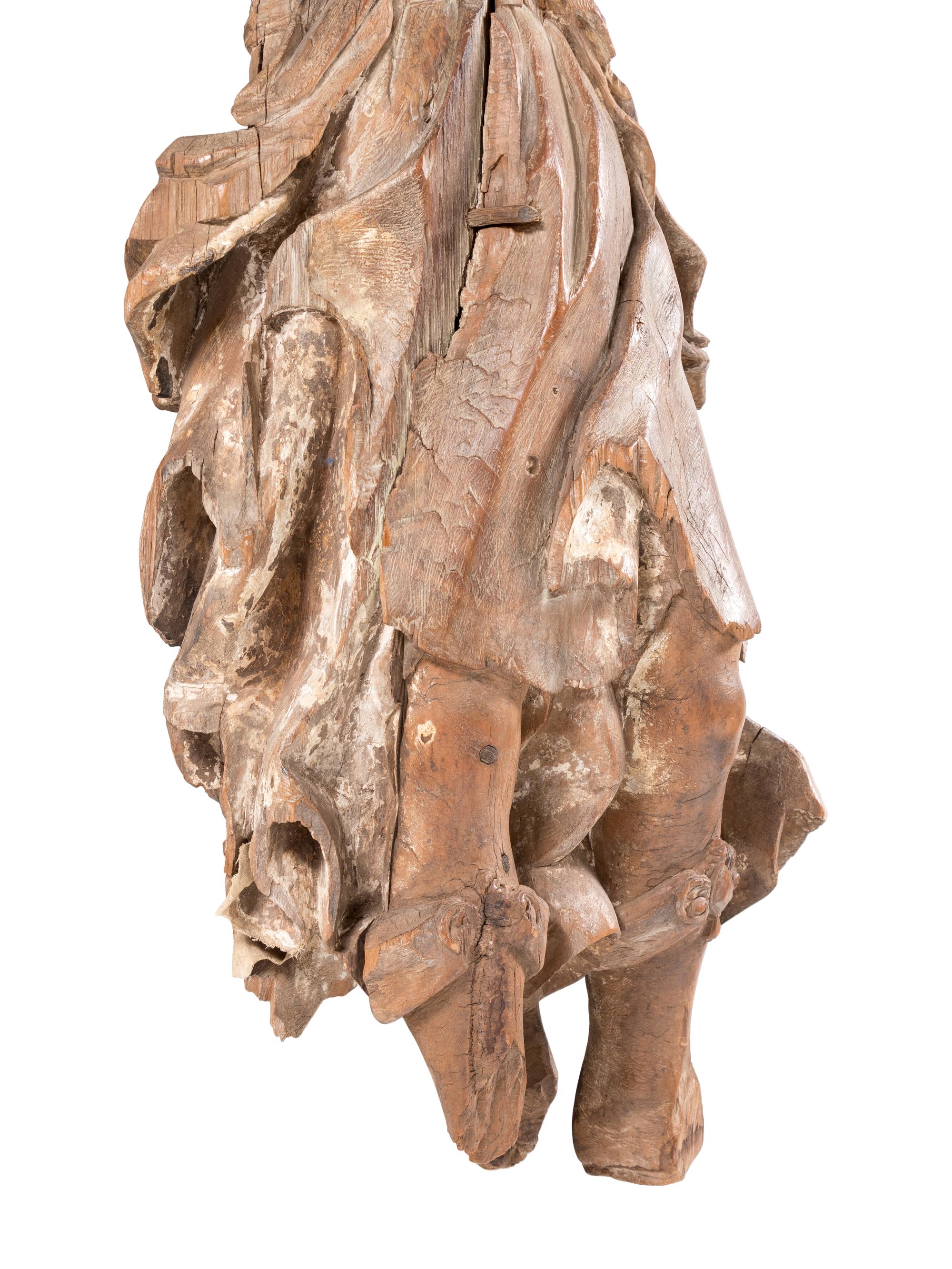 A Continental Carved Angel Figure