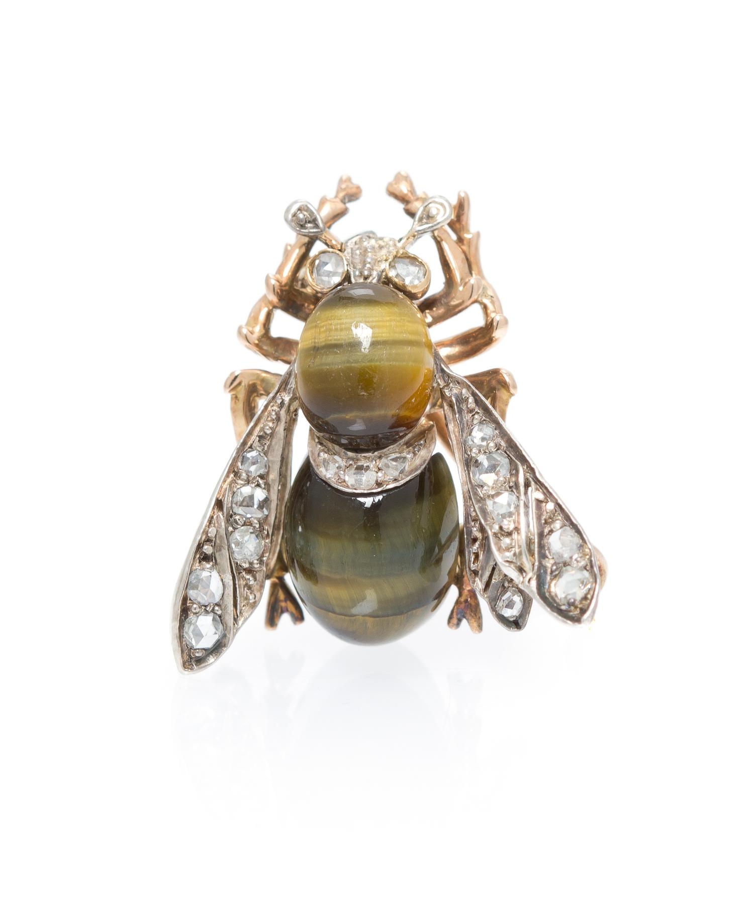An Antique Silver Topped Gold, Tiger's Eye Quartz and Diamond Bee Pin, 3.20 dwts.