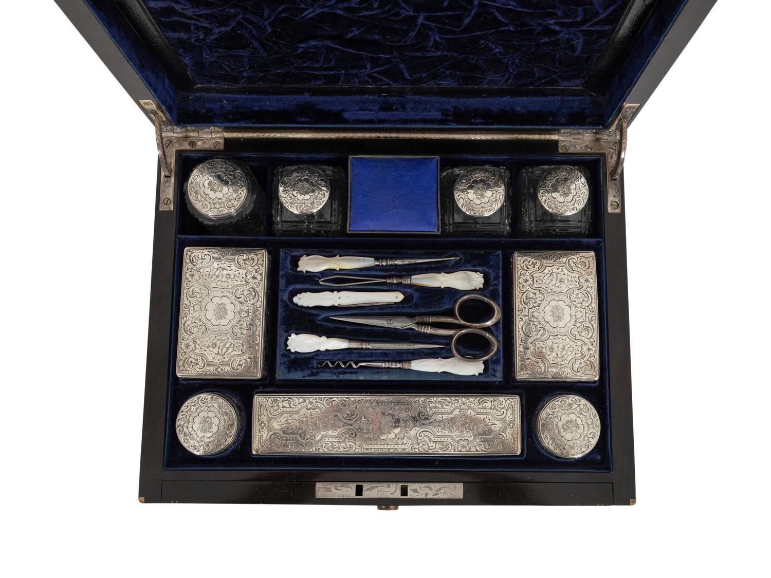 A Victorian Calamander Traveling Vanity Case with Silver-Mounted Accessories