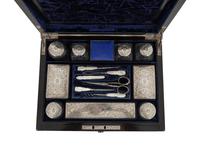 A Victorian Calamander Traveling Vanity Case with Silver-Mounted Accessories