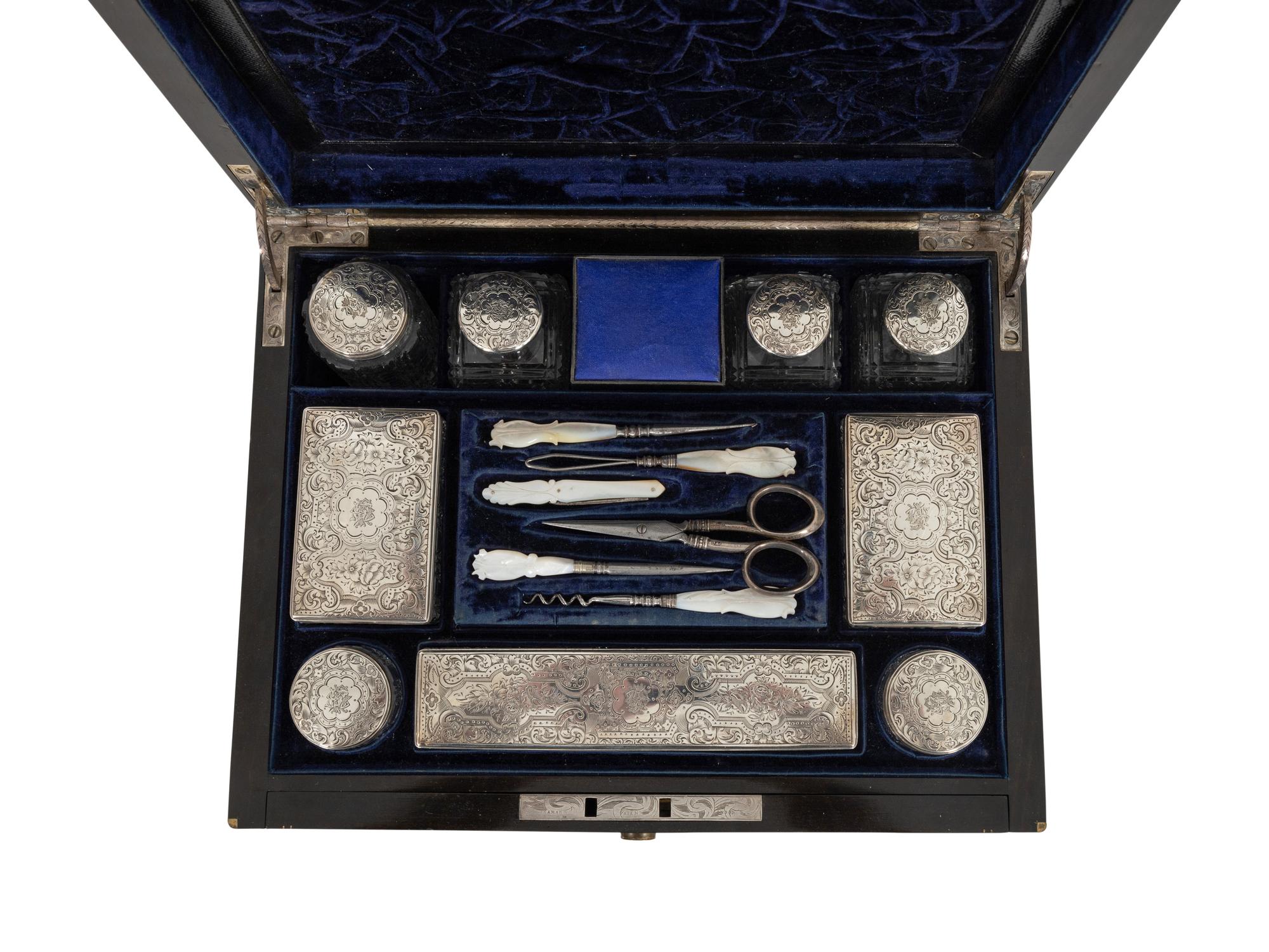A Victorian Calamander Traveling Vanity Case with Silver-Mounted Accessories