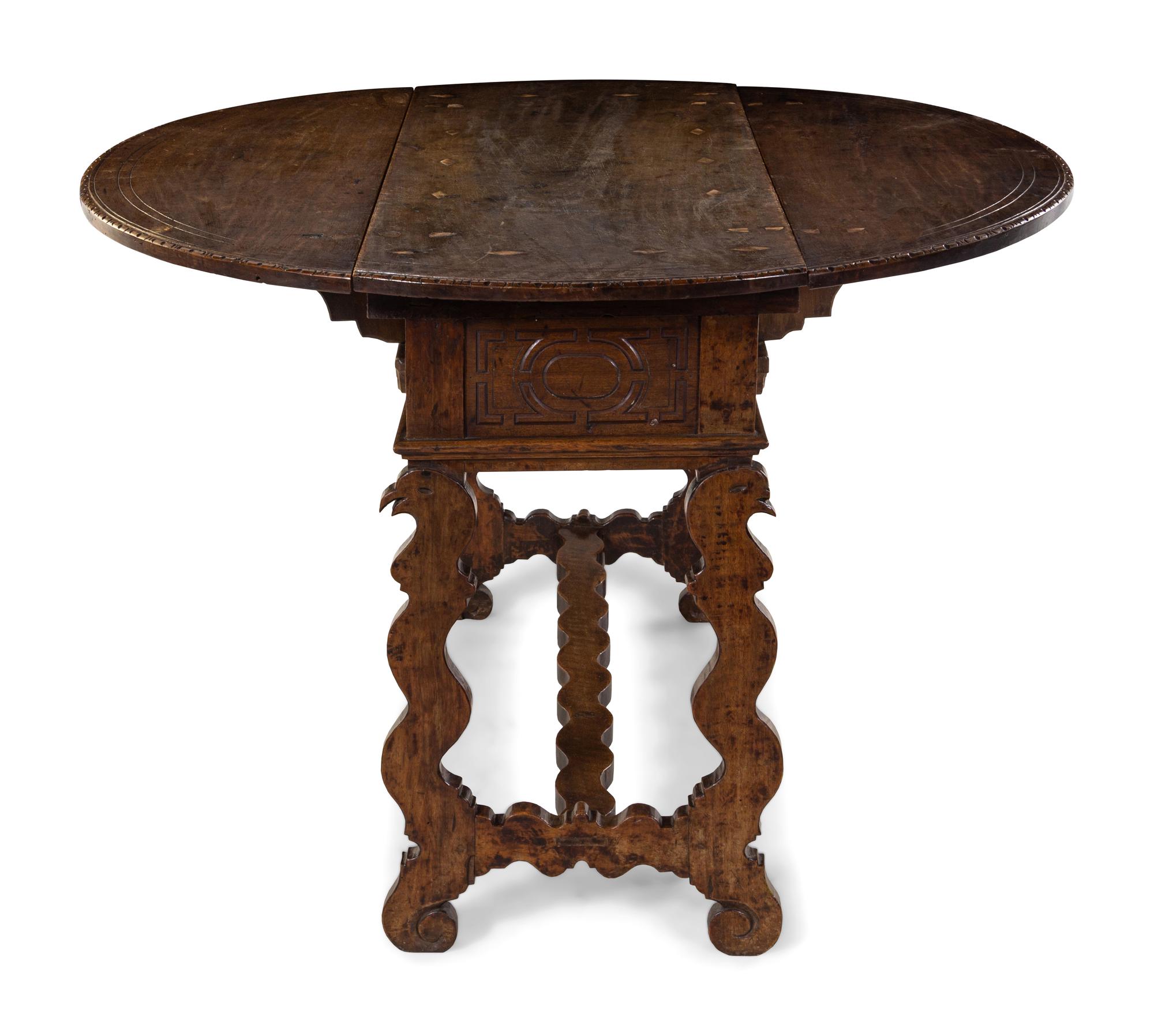 An Italian Walnut Drop-Leaf Table