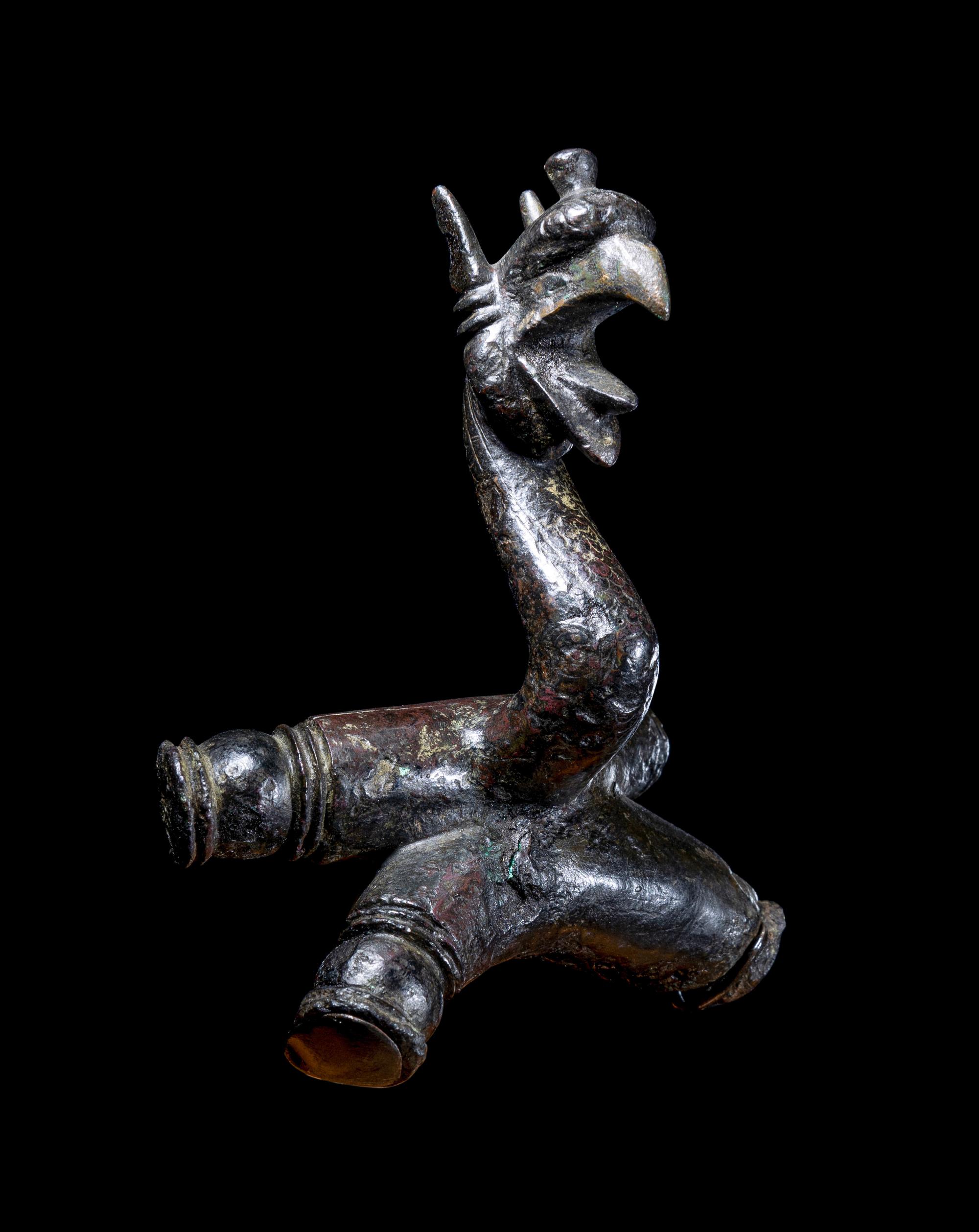 An East Greek Bronze Griffin Protome