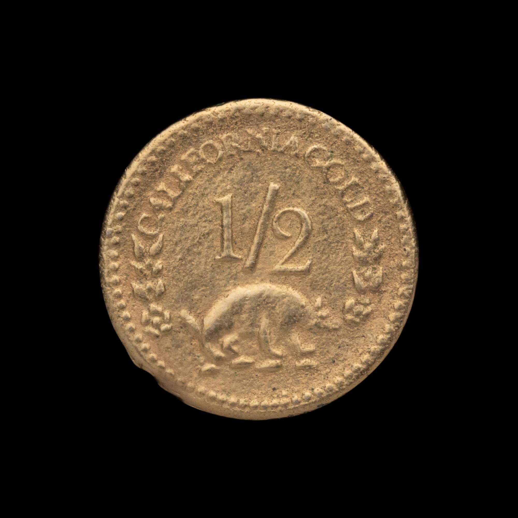 A Replica 1854-Dated 1/2 Dollar Gold Coin (0.5g)
