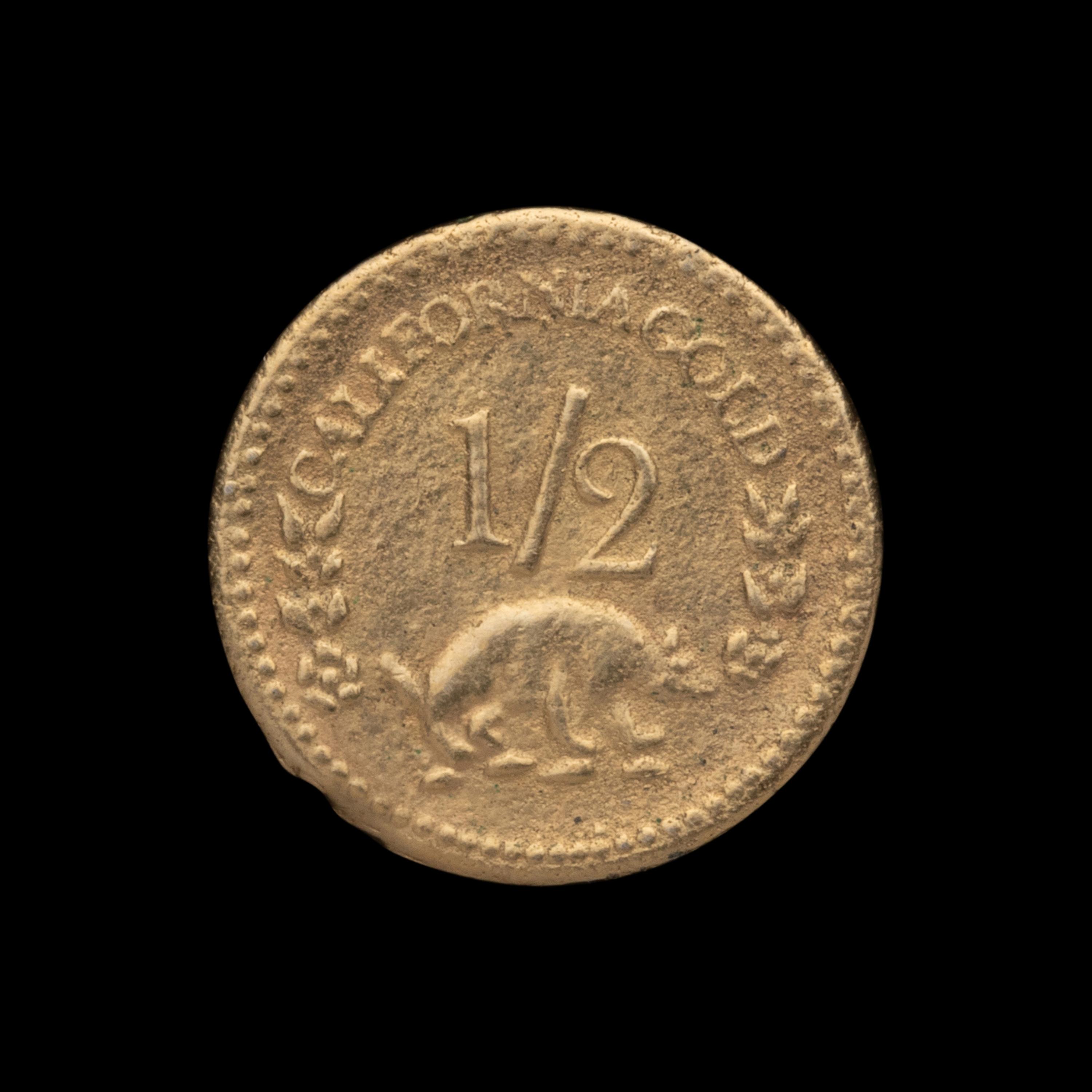 A Replica 1854-Dated 1/2 Dollar Gold Coin (0.5g)