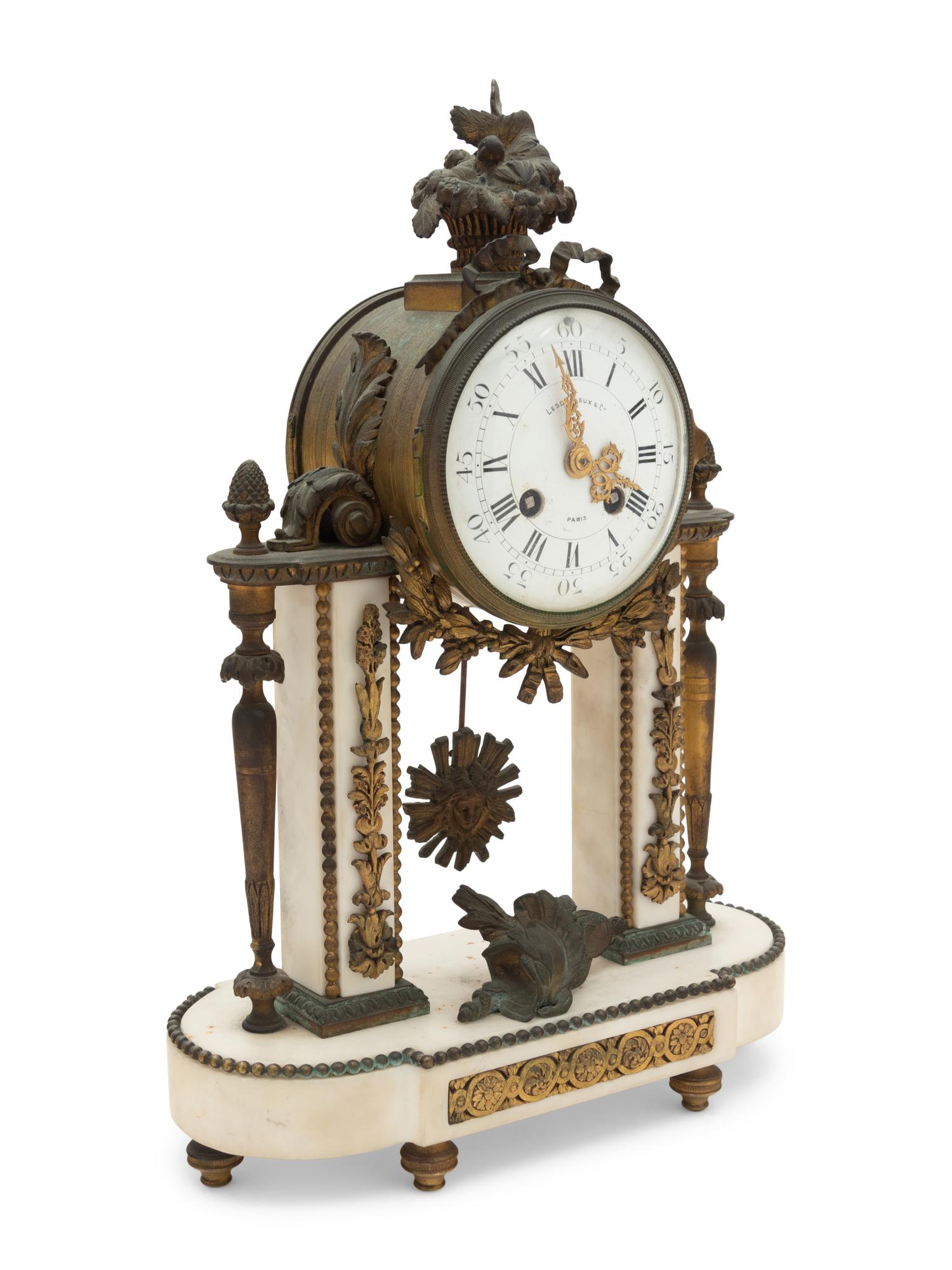A French Gilt Bronze and Marble Mantel Clock