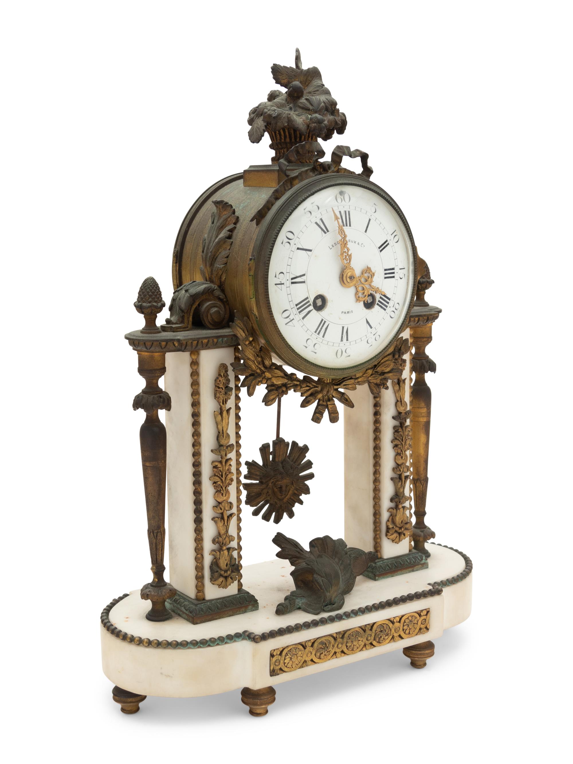 A French Gilt Bronze and Marble Mantel Clock