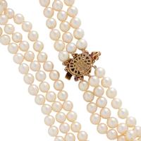 THREE STRAND CULTURED PEARL AND RUBY NECKLACE