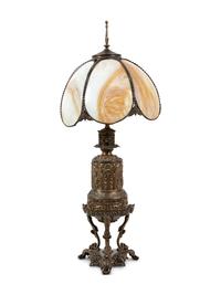 An American Renaissance Revival Slag Glass and Cast Metal Lamp