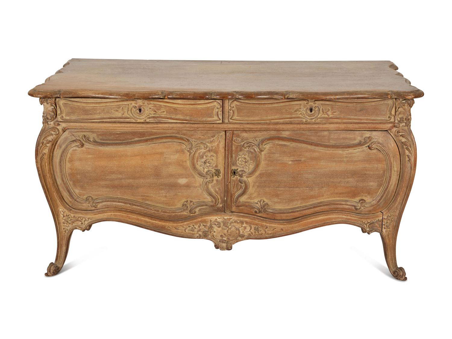 A Rococo Style Carved Bombe Side Cabinet