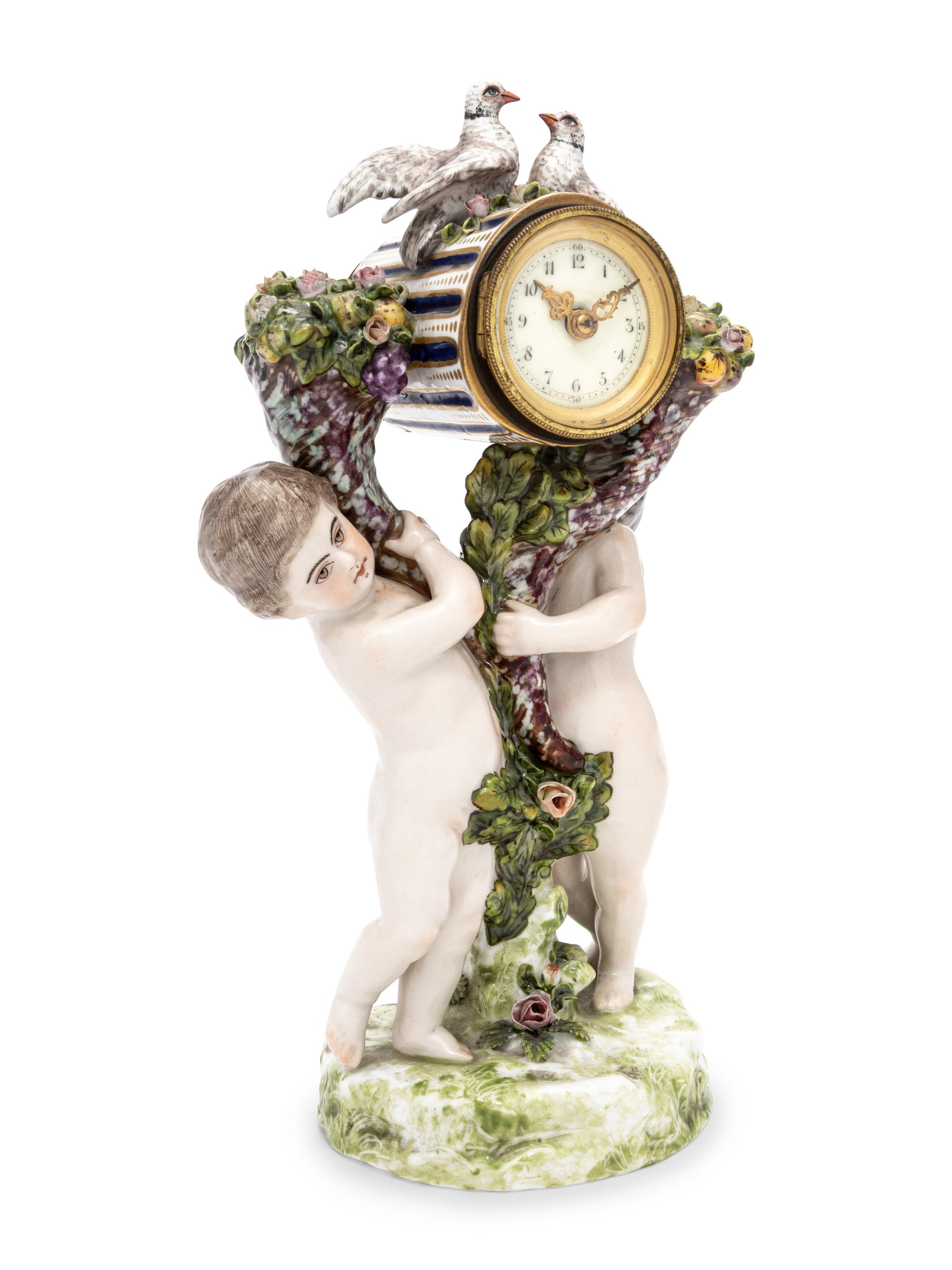 A Continental Figural Porcelain Clock