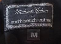 A Michael Hoban Black Leather Bustier, Size M.