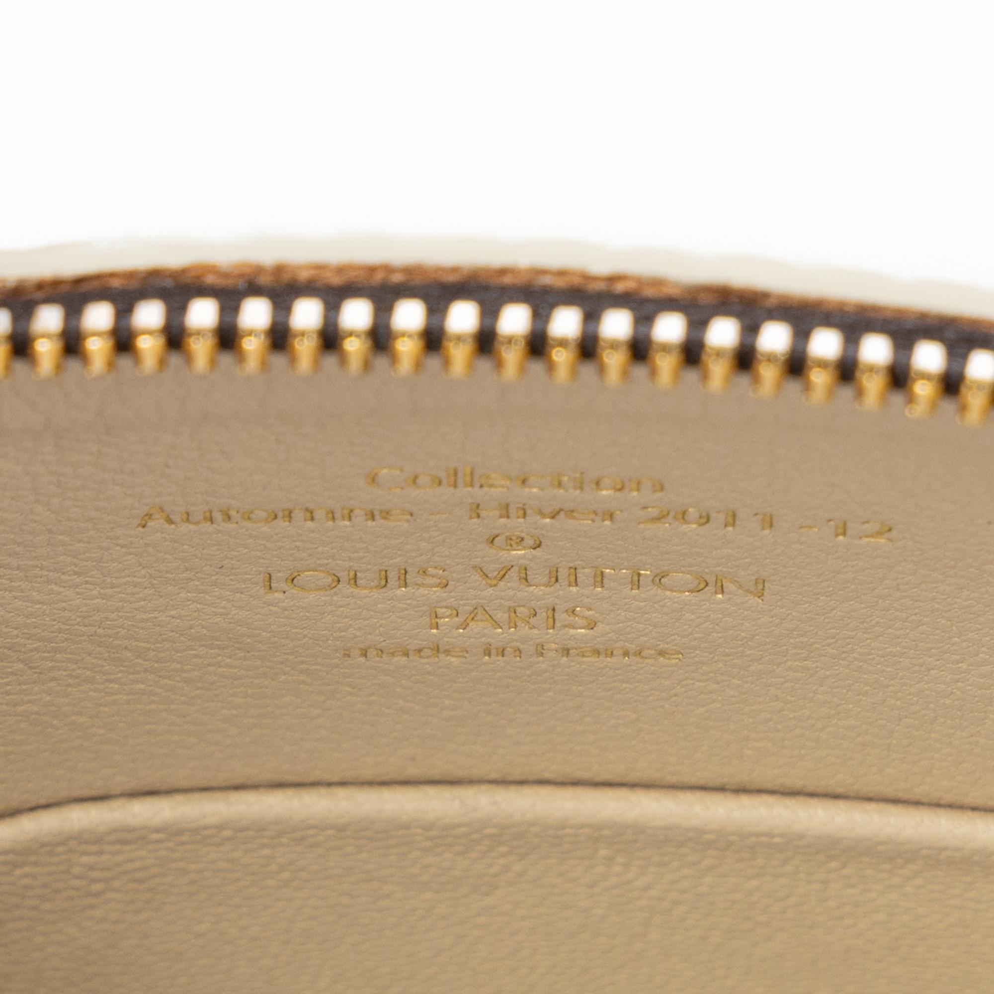 LOUIS VUITTON, MONOGRAM FETISH LOCKIT HANDBAG
