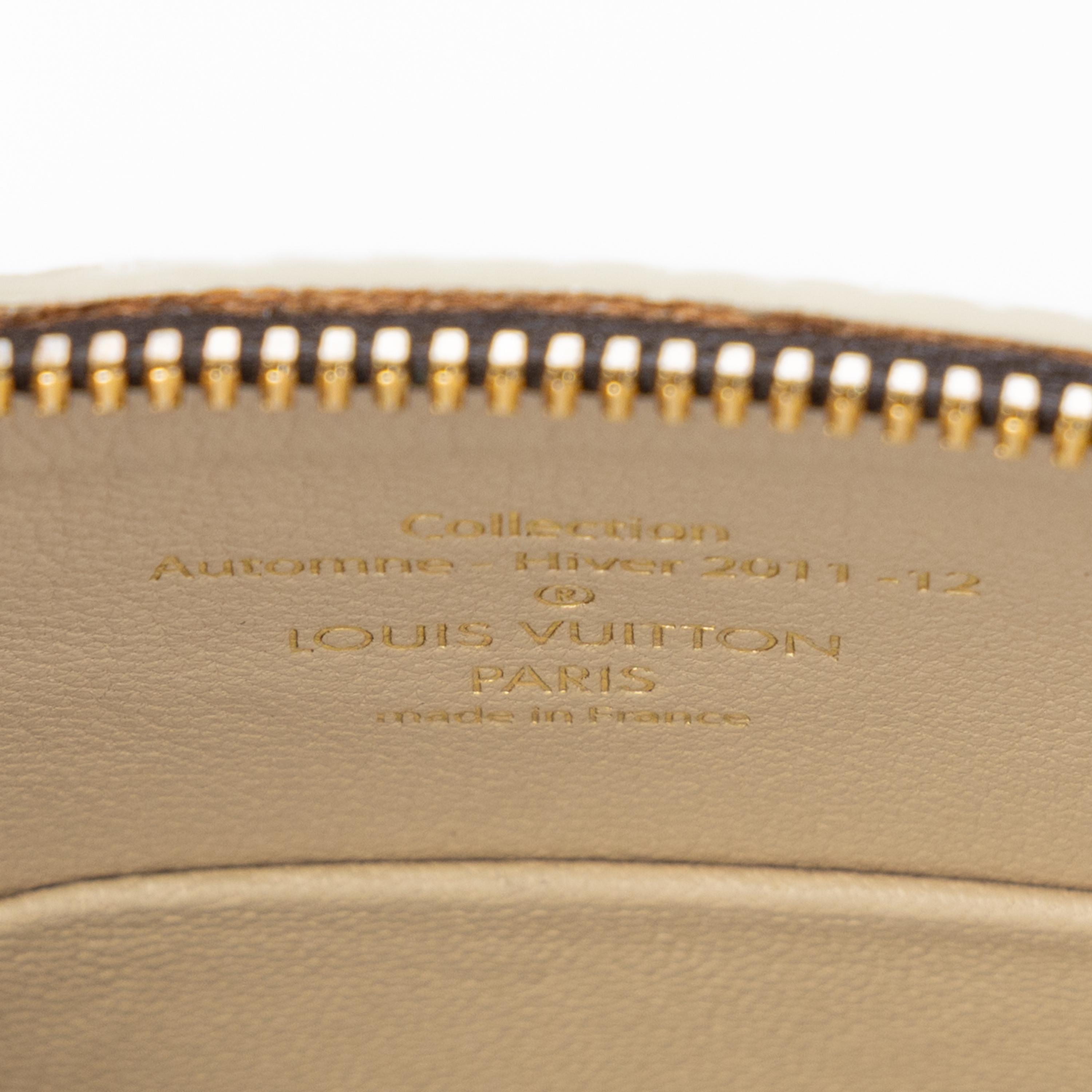 LOUIS VUITTON, MONOGRAM FETISH LOCKIT HANDBAG