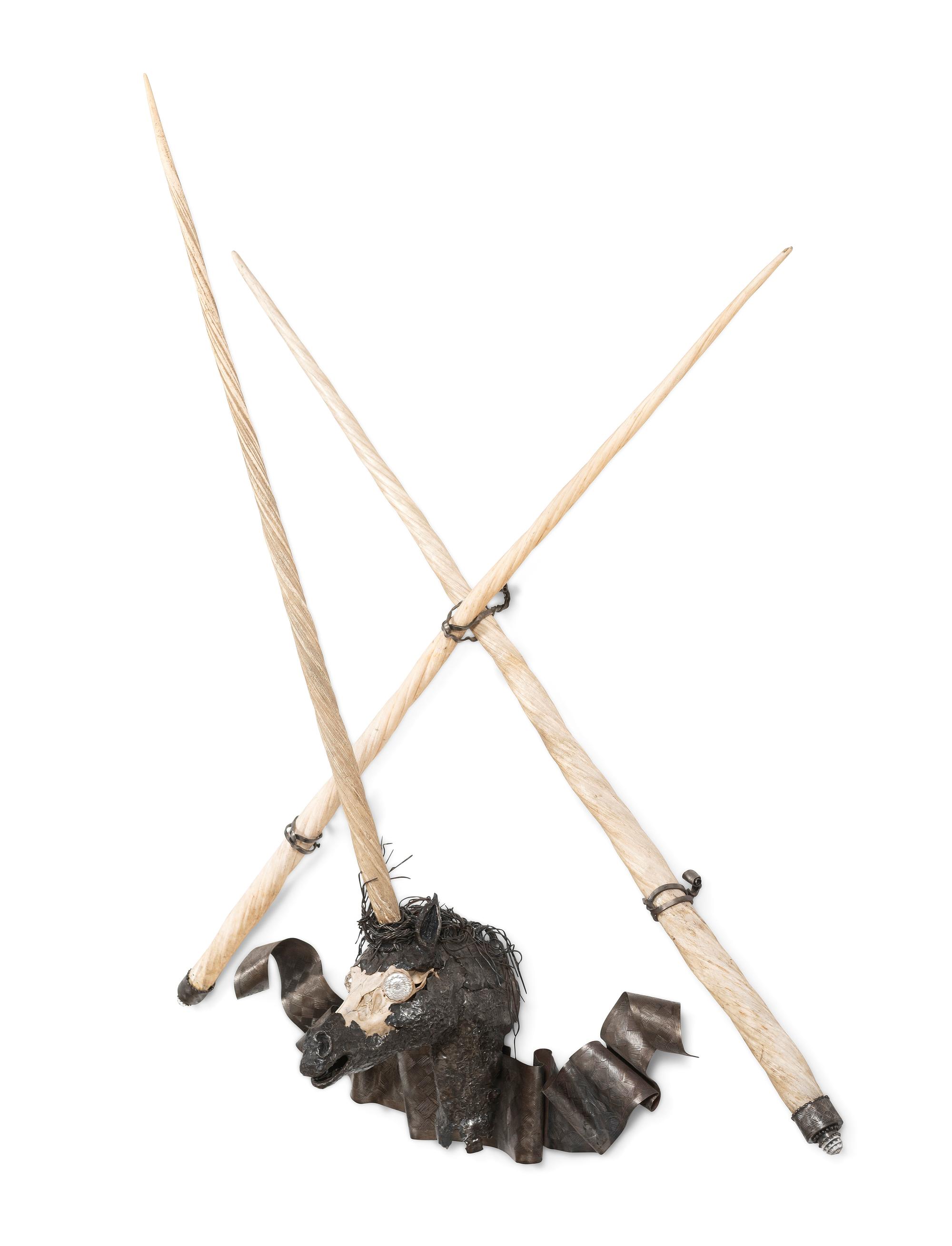 A Cast Metal, Bone, and Narwhal Tusk Installation