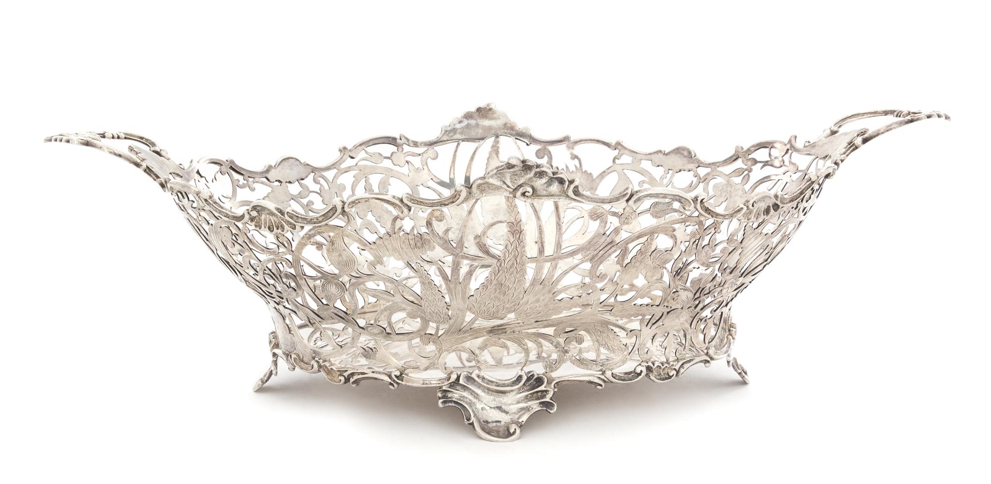 A Dutch Silver Center Basket, Likely Gerrit Duyzer, The Hague, Early 19th Century, the openwork body having floral, foliate and C-scrol