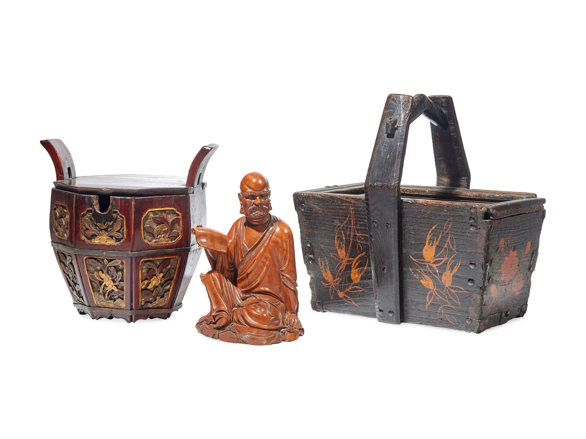 A Chinese Carved Boxwood Seated Immortal and Two Chinese Lacquered Wood Baskets