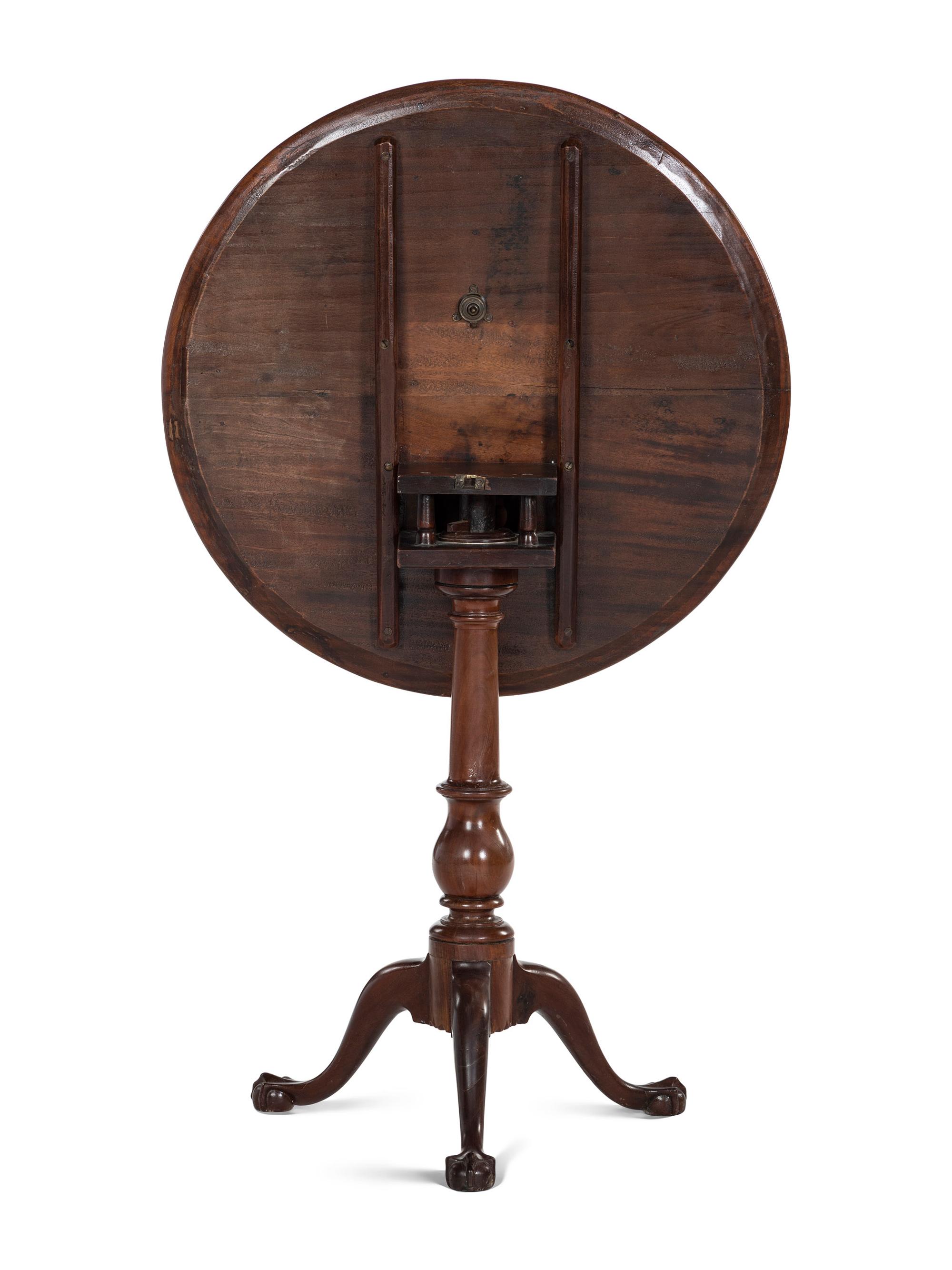 A Chippendale Walnut Claw and Ball Foot Tilt-Top Tea Table
