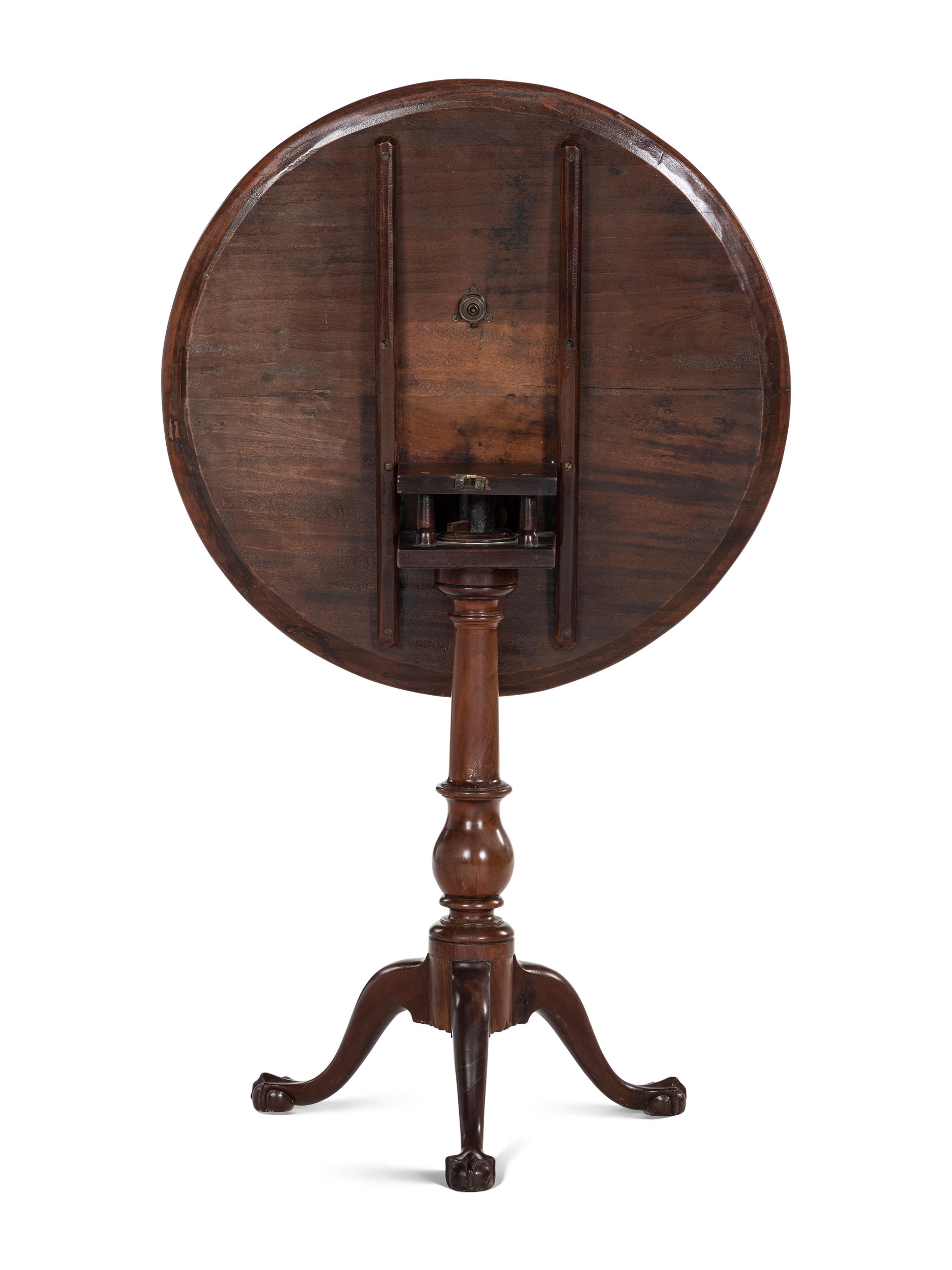 A Chippendale Walnut Claw and Ball Foot Tilt-Top Tea Table