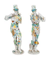 A Pair of Monumental Italian Gilt and Polychrome-Glazed Terracotta Figures of Masked Performers