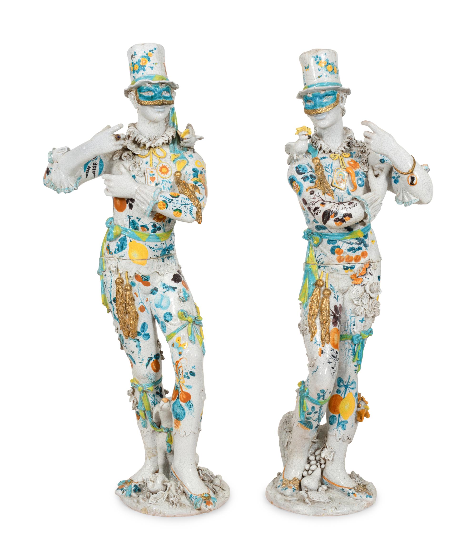 A Pair of Monumental Italian Gilt and Polychrome-Glazed Terracotta Figures of Masked Performers
