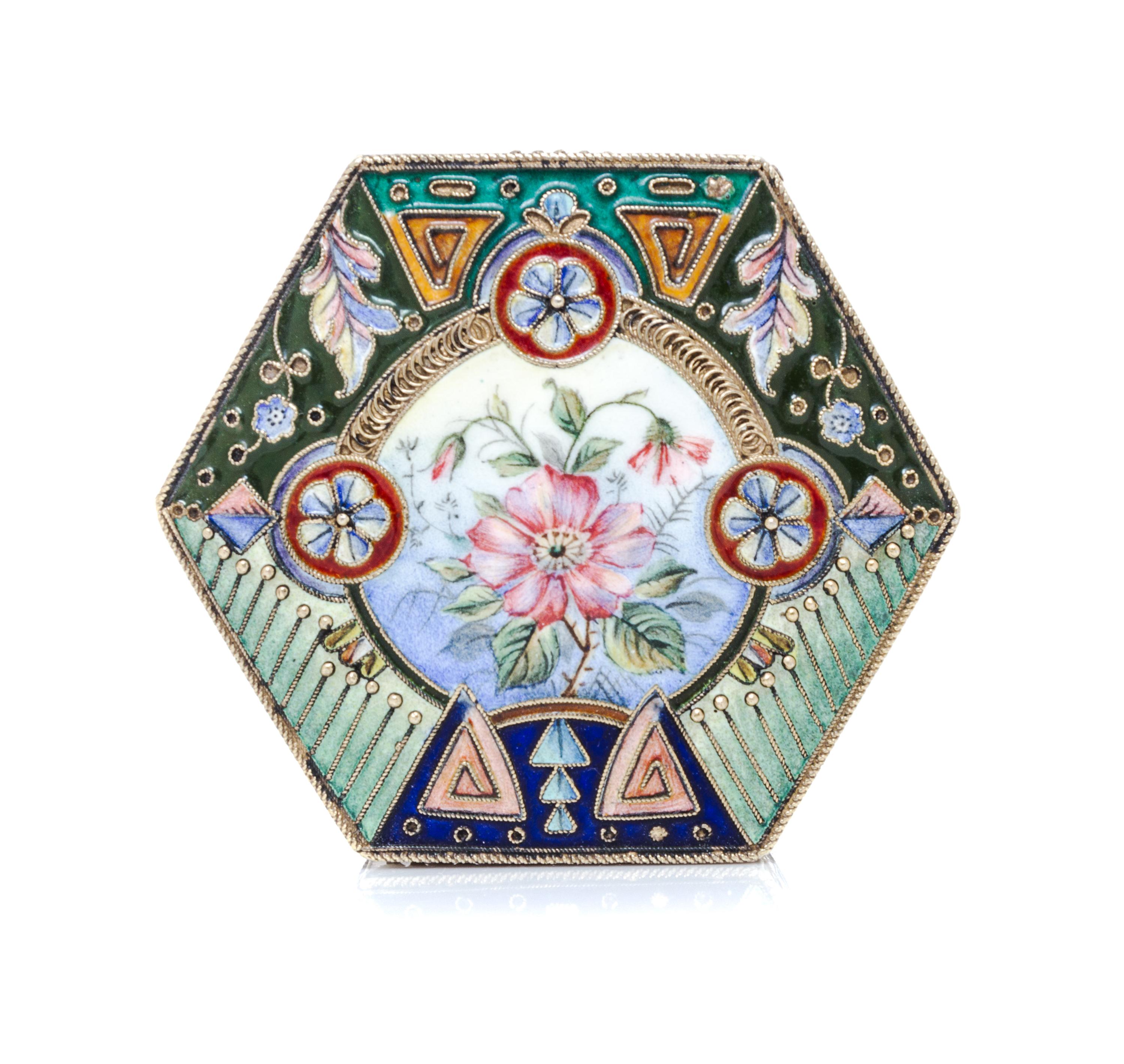 A Russian Enameled Silver-Gilt Snuff Box, Mark of Sixth Artel, Moscow, early 20th century, of hexagonal form, the lid centered by a flo