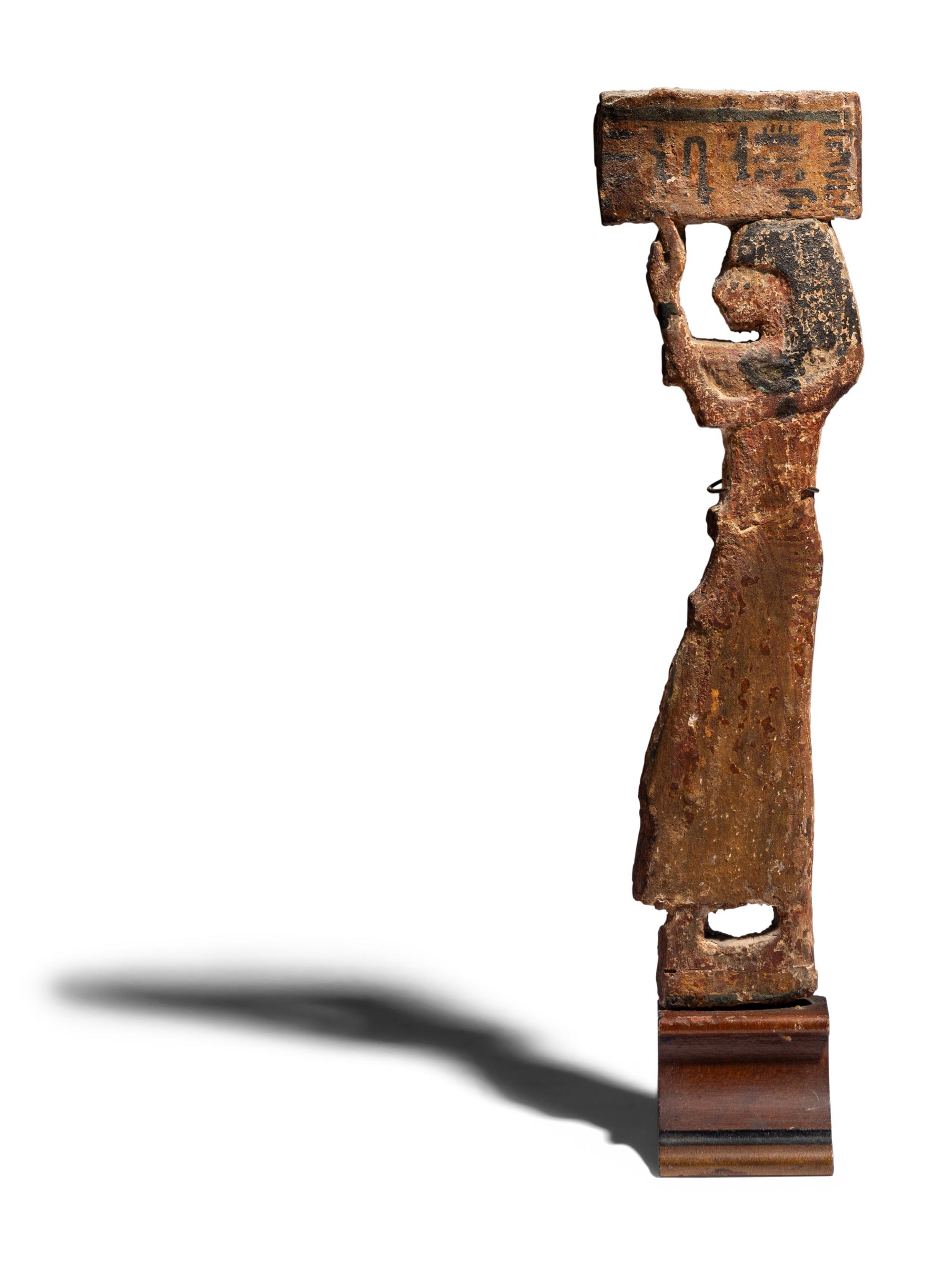 An Egyptian Wood Offering Bearer